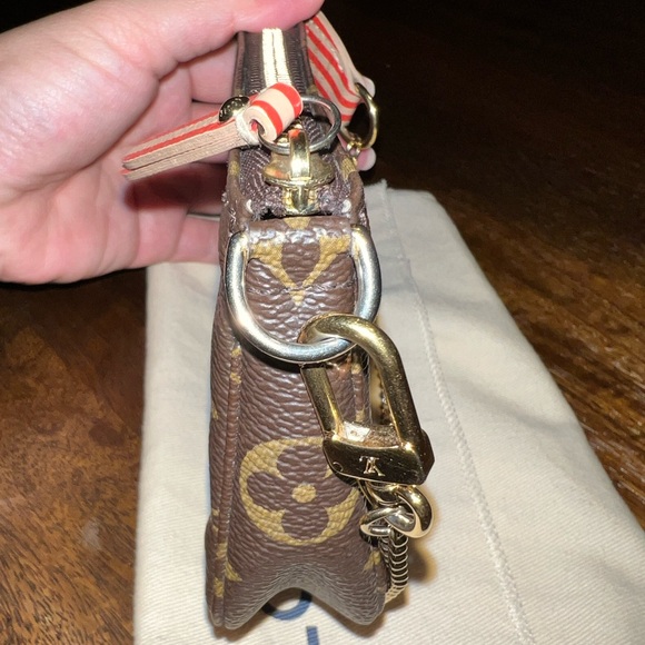 Pre-loved Louis Vuitton Limited Edition Trunks Edition Monogram Mini Pochette - Picture 9 of 10